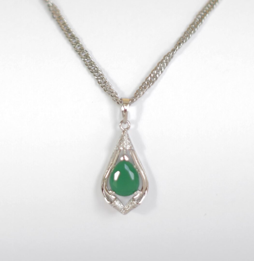 Qafore dhe varëse të flakëruar në argjend QVAGJ, e argjendtë/gjelbër